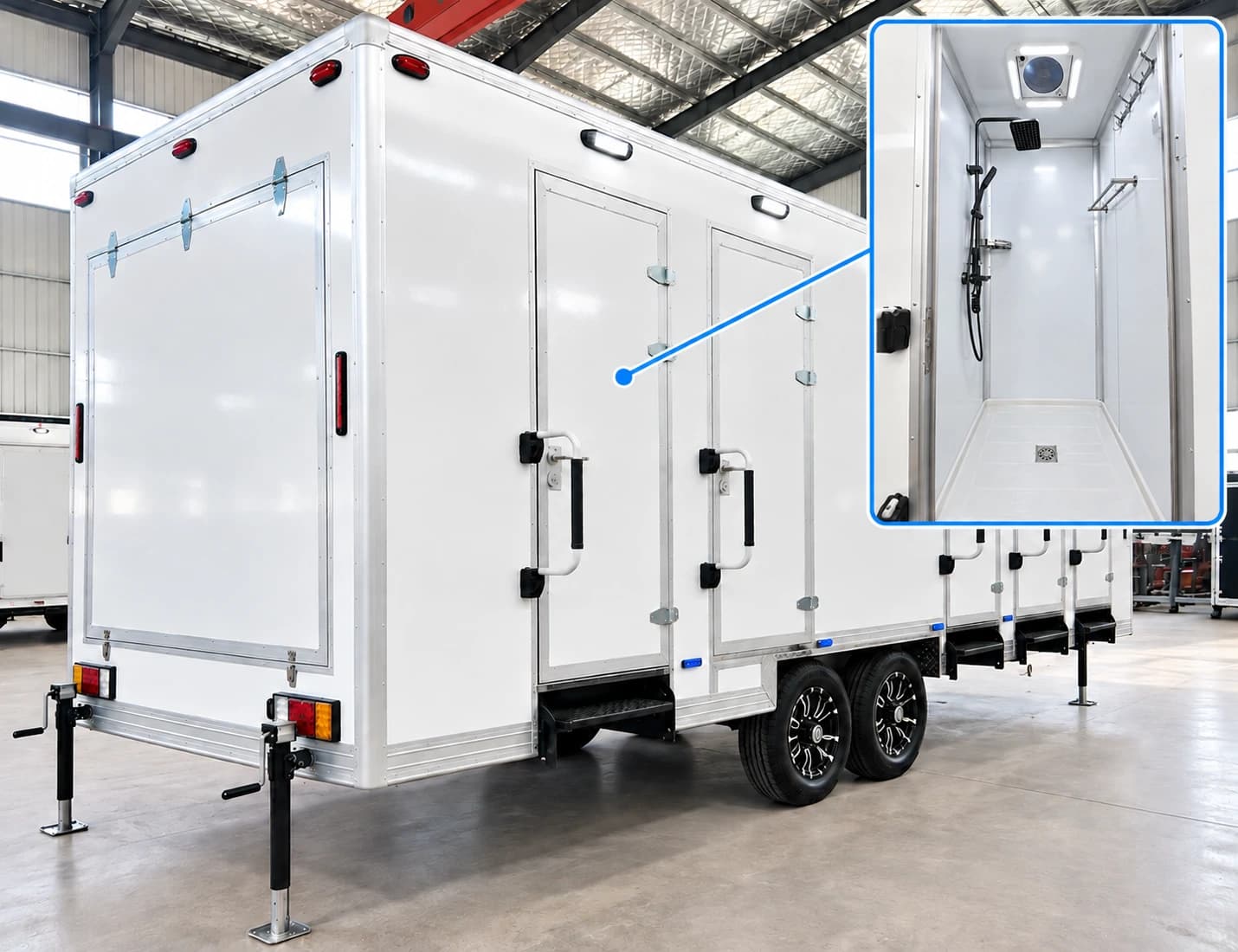 White shower trailer with several exterior doors and an inset shower-stall view